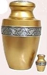 Gold urn with decorative band and smaller matching urn 