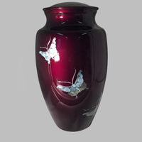 a mother of pearl butterfly themed cremation urn