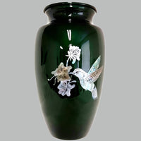 a mother of pearl hummingbird themed cremation urn